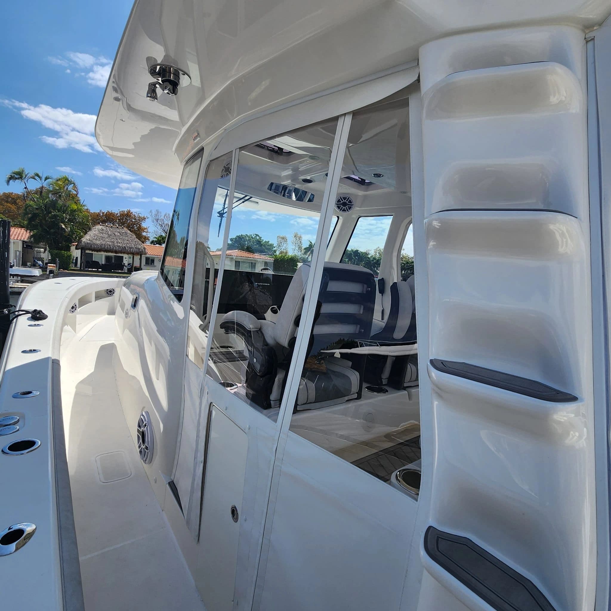 Clear enclosure with zippered door panel on a center console