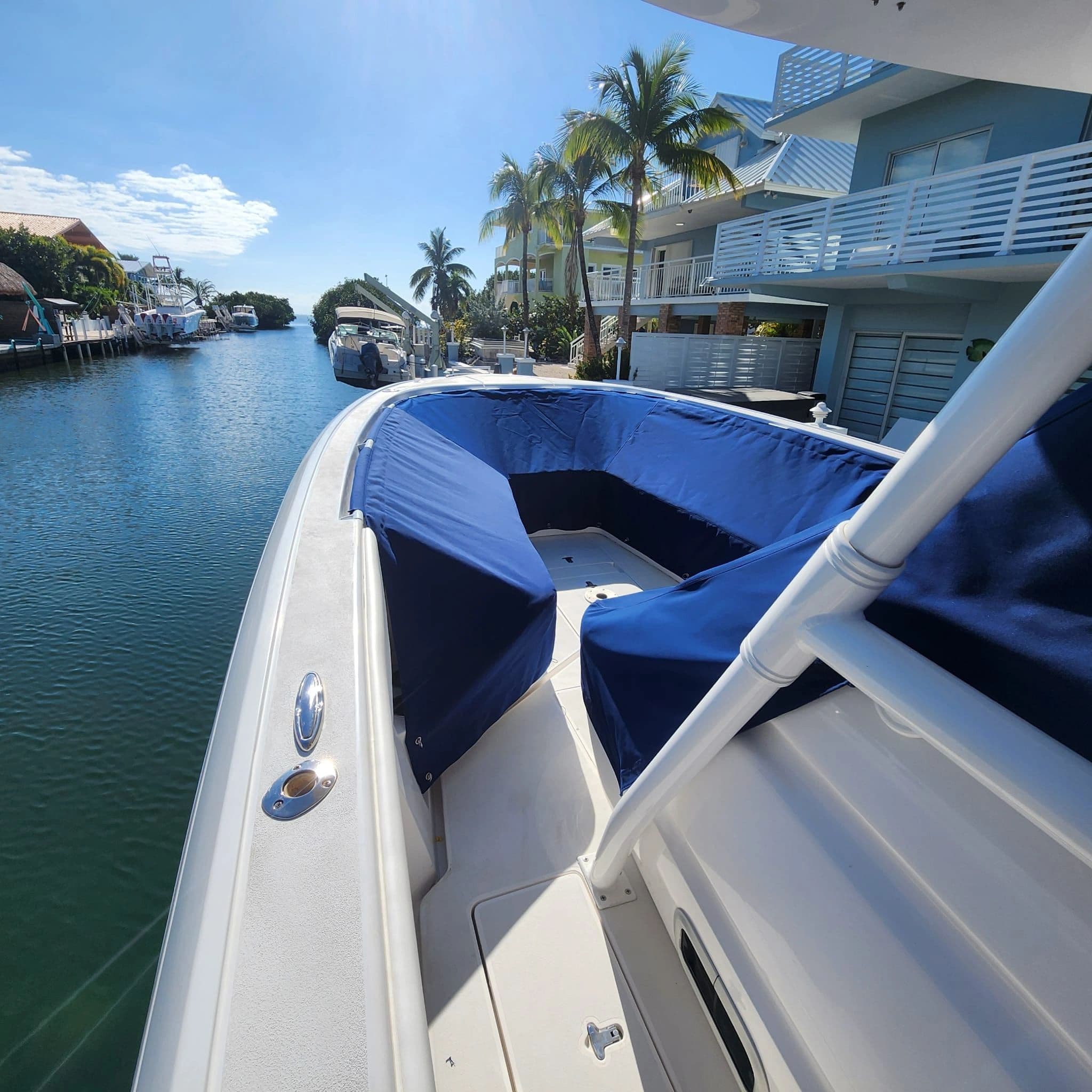 Navy bow covers fitted on a center console in a canal